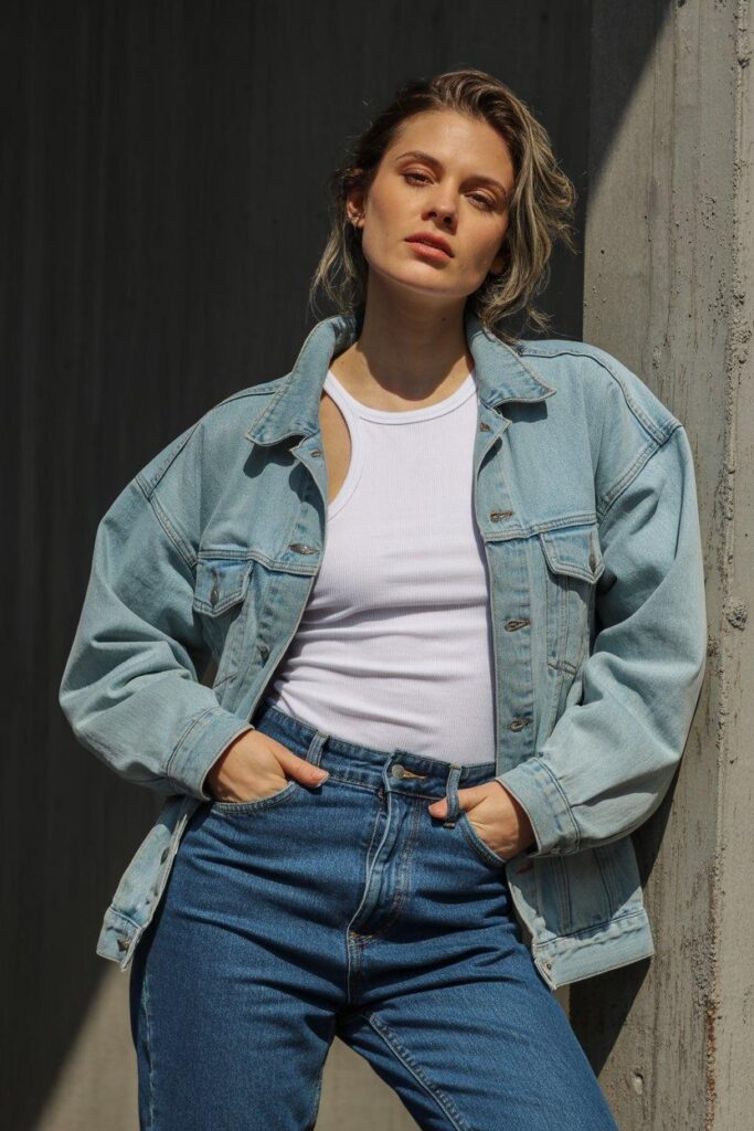 Double denim outfit mixing light and dark washes for trendy monochrome style
