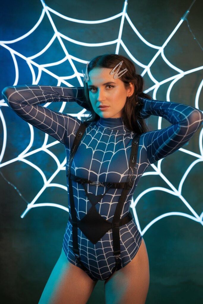 Spider siren Halloween rave outfit with web bodysuit and harness